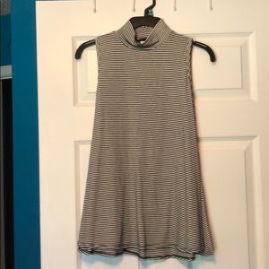 Large black and white turtleneck tank